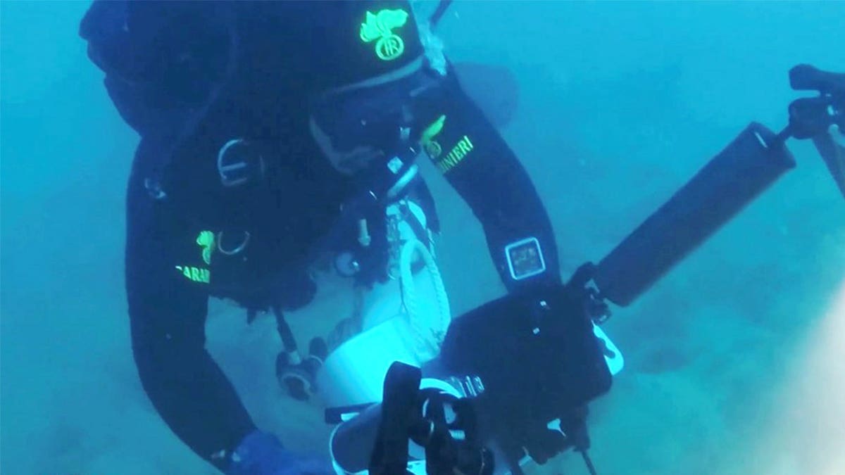 Diver at site of wreck