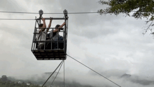 Rescuers use ziplines to transport trapped citizens after devastating Nepal floods decimate country’s bridges