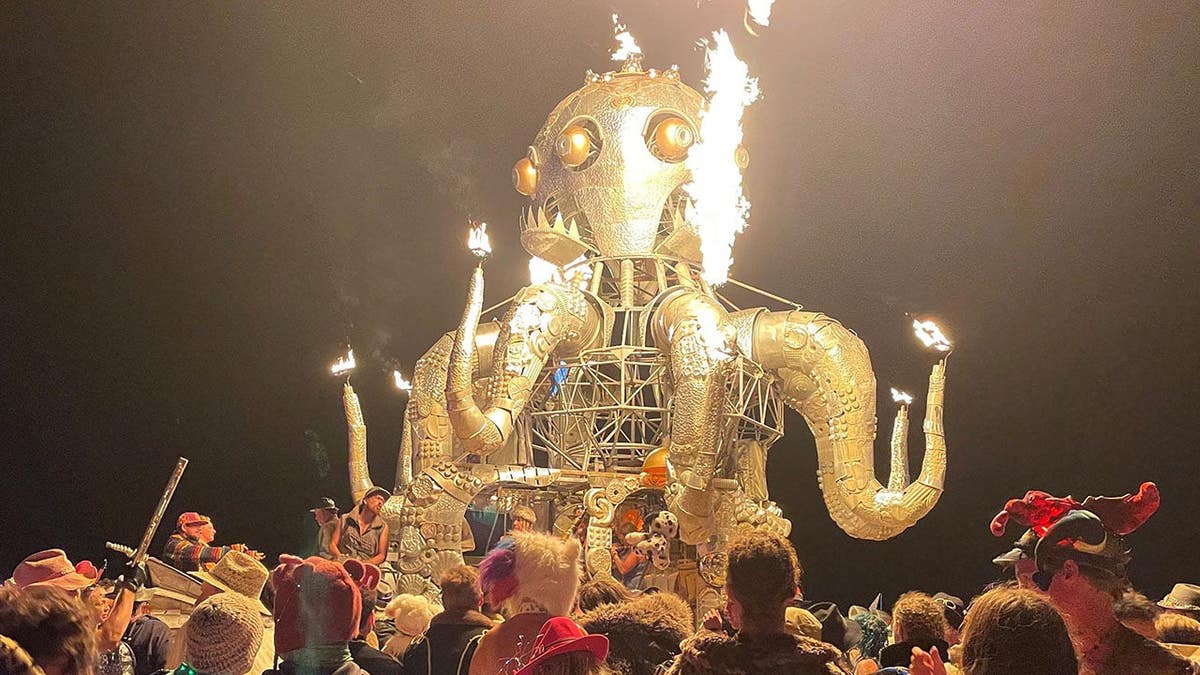 Attendees dancing at the Burning Man Festival in Nevada