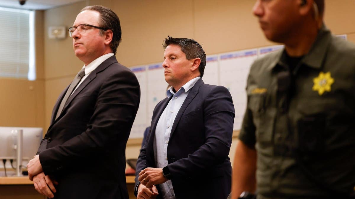 Dominic Foppoli appears in court with his lawyer