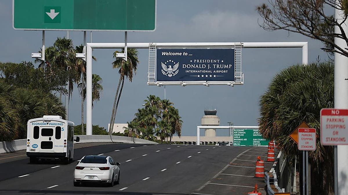 A sign welcomes drivers to the President Donald J. Trump International Airport on July 09, 2026, in Palm Beach, Florida.