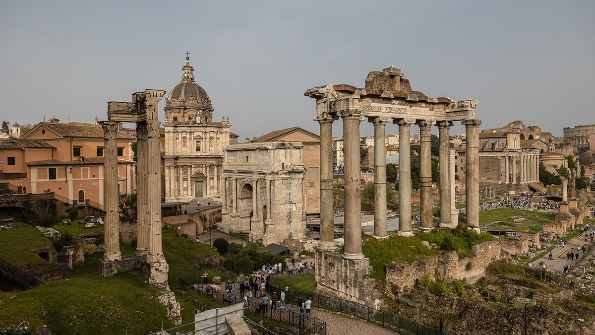 View of ruined temple near the Colosseum in Rome