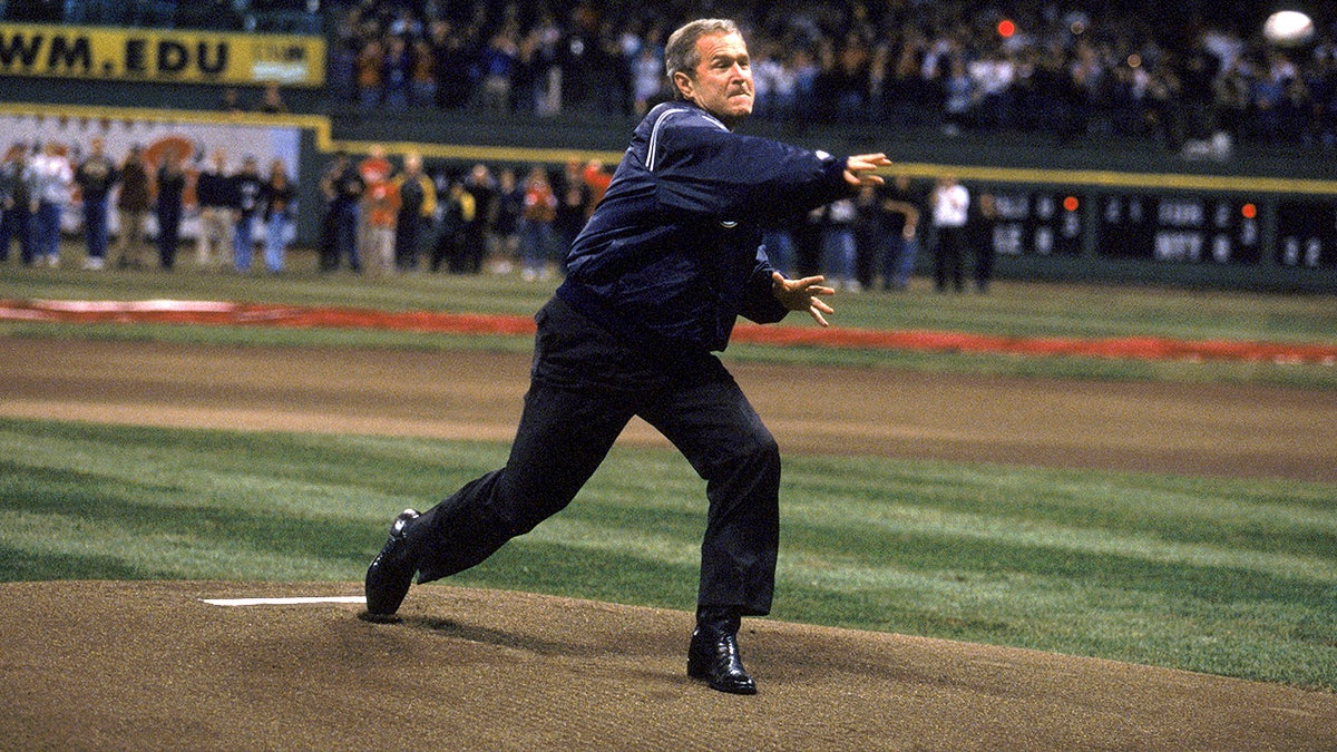 President George W. Bush throws ceremonial first pitch at Yankee Stadium.