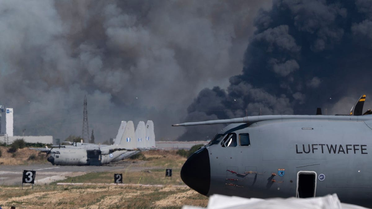 Smoke rises after a Hellenic Air Force F-4 Phantom fighter jet crashed during an airshow at Tanagra Air Force Base near Athens.