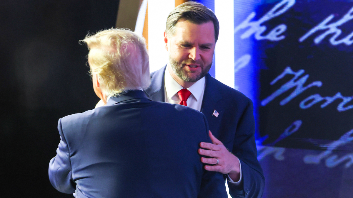 U.S. Vice President JD Vance hugs U.S. President Donald Trump on the second day of the 2026 Republican National Convention at the American Airlines Center on September 10, 2026 in Dallas, Texas.