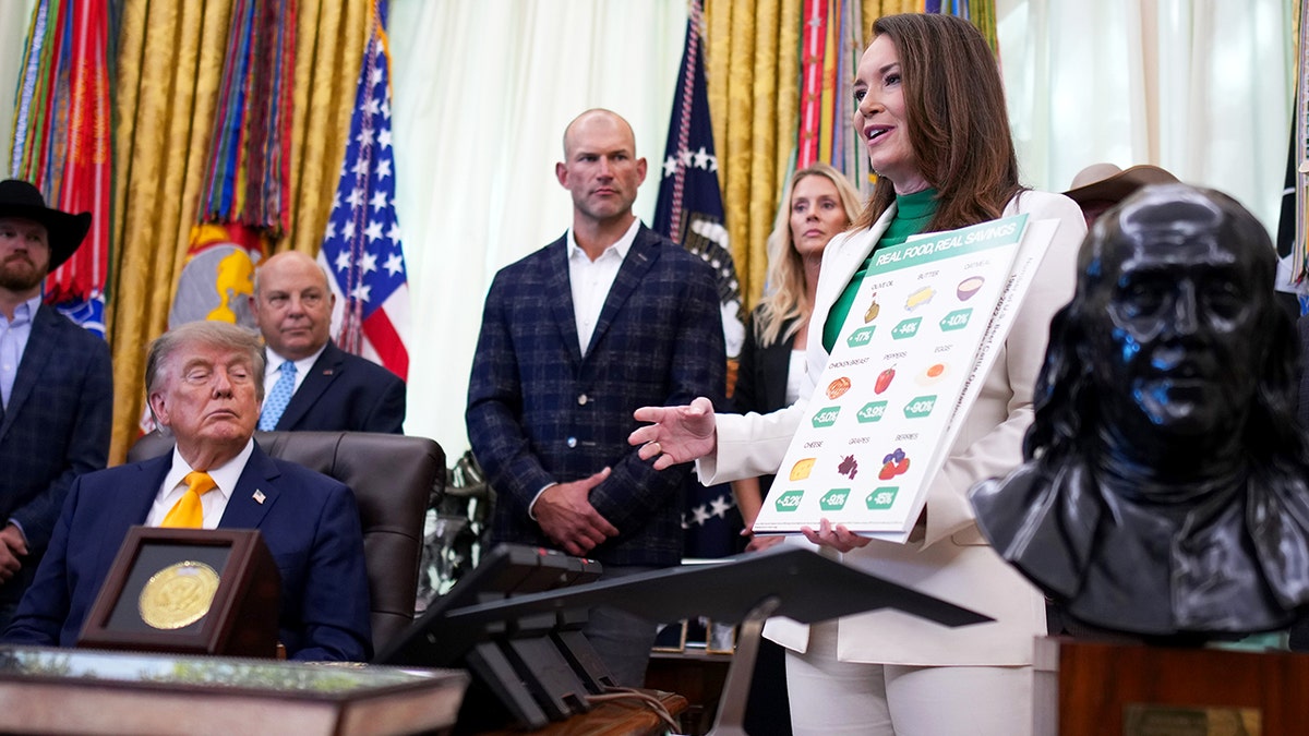 Joe Thomas and Brooke Rollins at President Donald Trump signing
