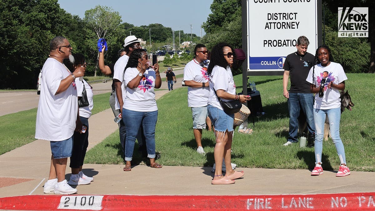 Demonstrators showing support for Karmelo Anthony outside Collin County Courthouse in McKinney Texas