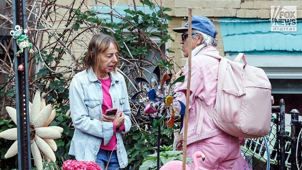 Medea Benjamin and Tighe Barry arriving home in Washington D.C.