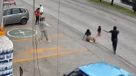 Video captures grocery store manager’s daring rescue of toddler who ran into oncoming traffic
