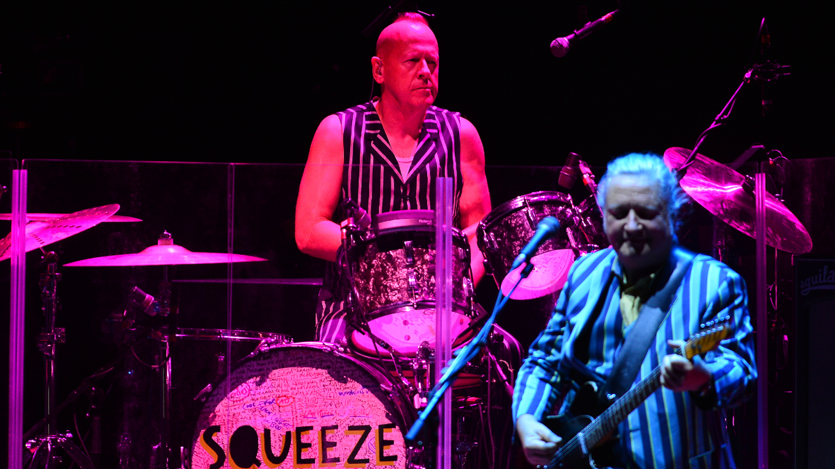 Simon Hanson and Glenn Tilbrook of Squeeze perform live on stage