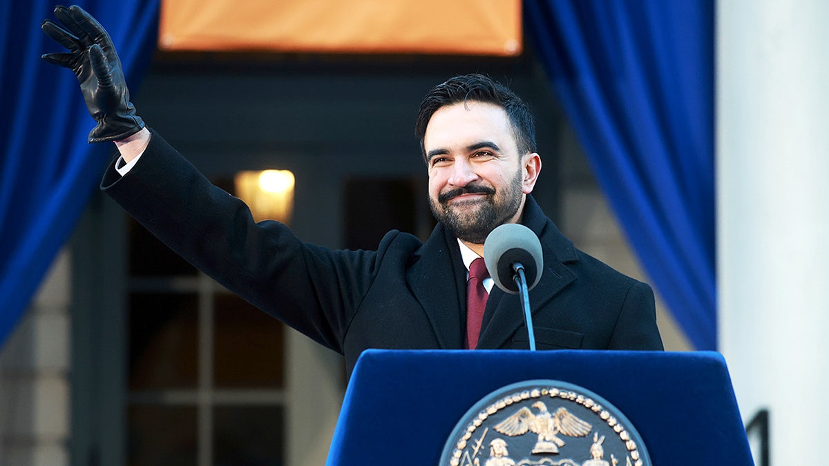 New York City Mayor Zohran Mamdani speaks at a podium after being sworn in at City Hall.
